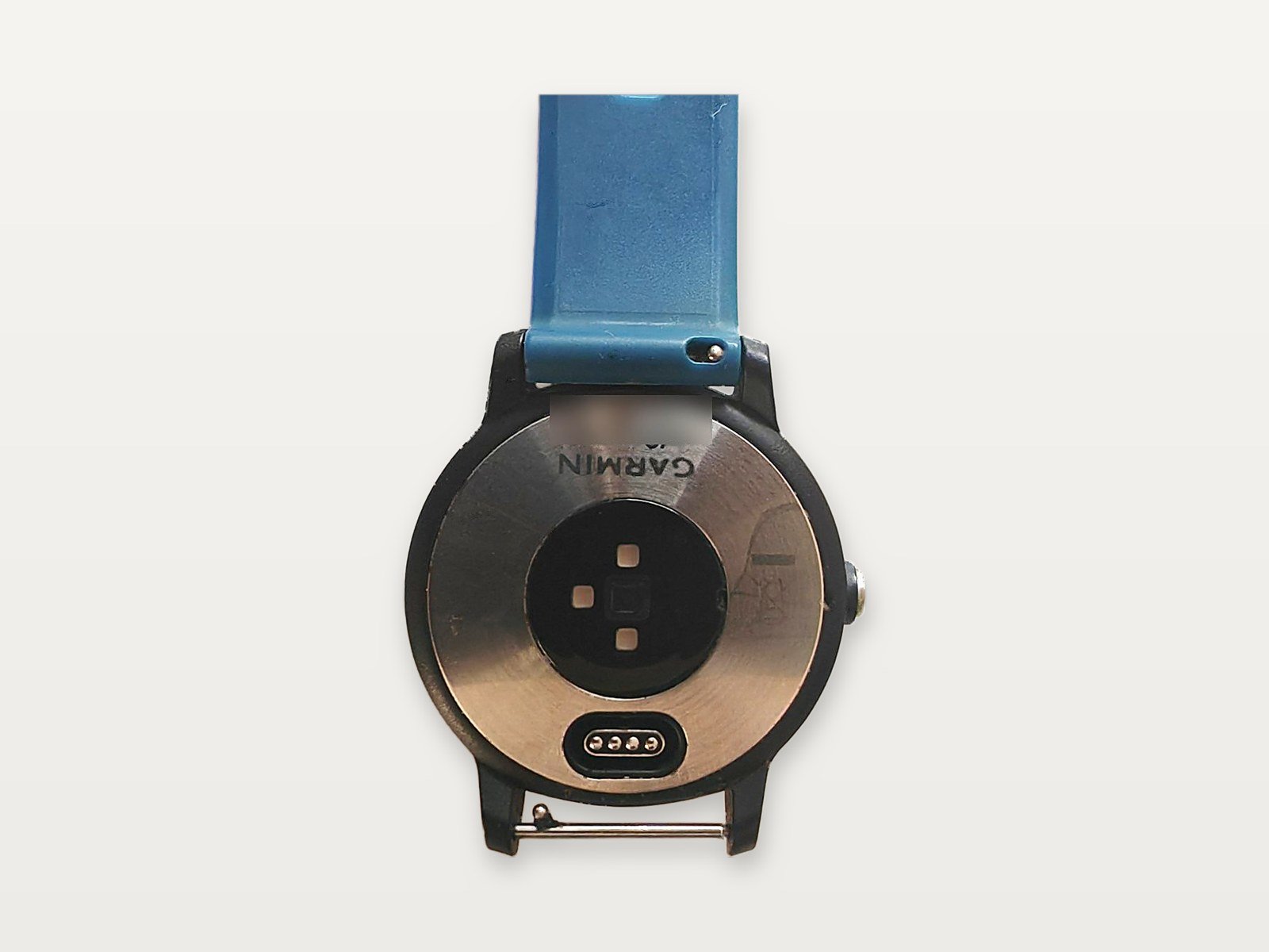 Parte trasera de mi Garmin Vivoactive 3 con el sensor de pulso